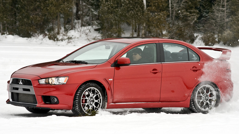 Illustration for article titled Subaru Impreza WRX and STI VS. Mitsubishi Lancer Evolution: Who Ya Got?